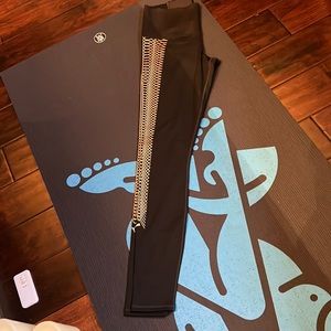 Brand new puma leggings in black with bronze design